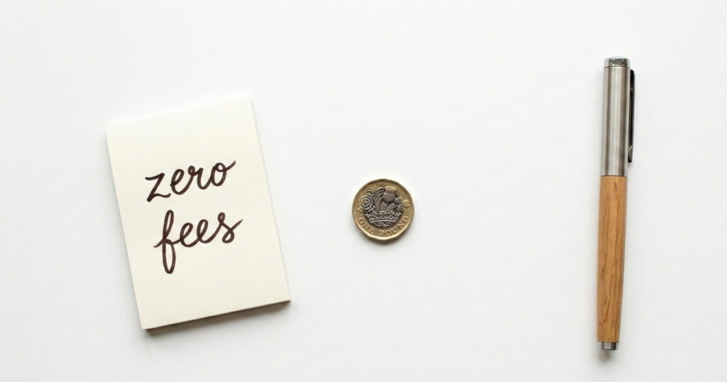 Zero platform fees concept for Trading 212 stocks and shares ISA with pound coin on white desk